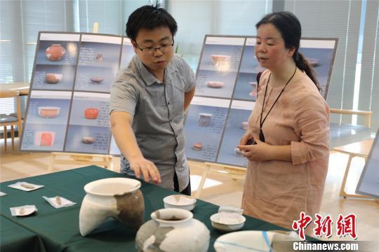图为文物遗存进行展示。 管亦鸣 摄