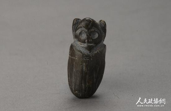 石猴形饰件 新石器时代 北京市平谷区上宅文化出土 图片由首都博物馆提供