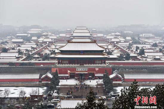 图为雪中的故宫博物院。<a href='http://www.chinanews.com/' >中新网</a>记者 金硕 摄 图为雪中的故宫博物院。中新网记者 金硕 摄