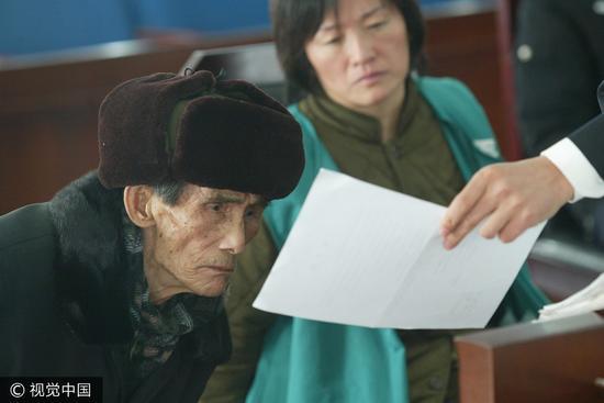 2009年,当时99岁的周志评在朝阳法院受审。/视觉中国