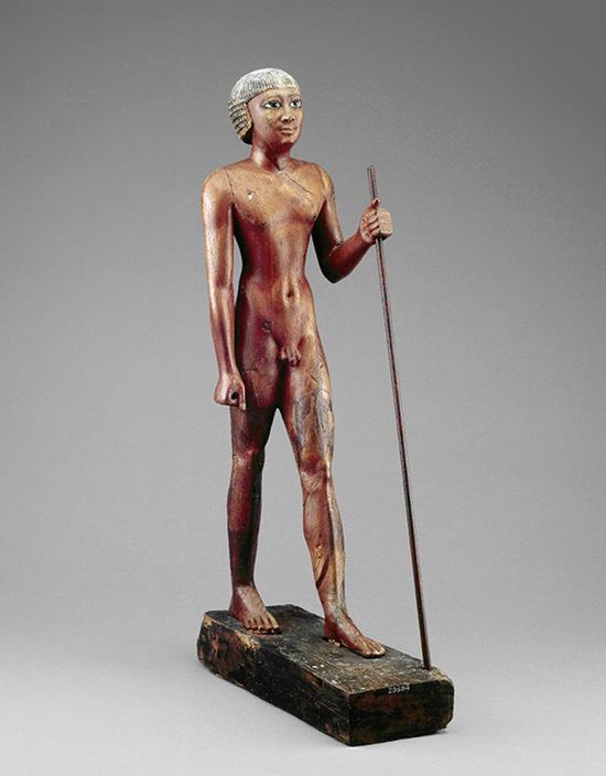 《官吏立像》(Nude figure of the Seal Bearer Tjetji),古埃及第6王朝,约前2321年,木制彩绘,高75厘米,伦敦大英博物馆