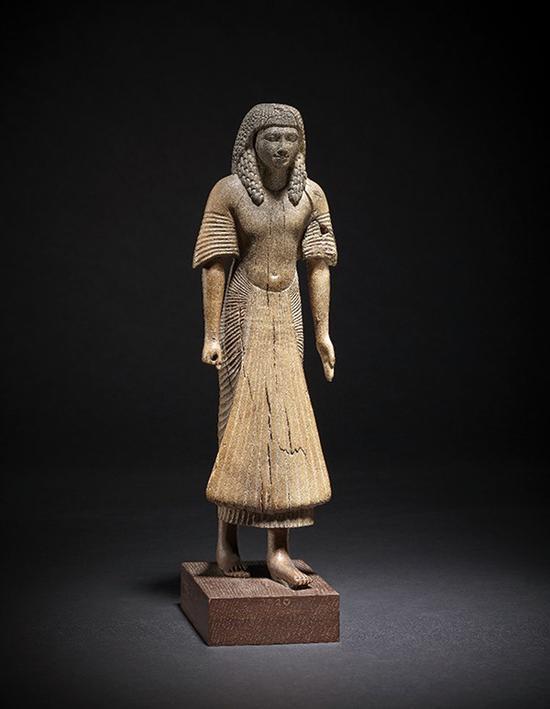 《妇女像》(Female Figure),古埃及第18王朝,约前1400年,木质,高32厘米,伦敦大英博物馆