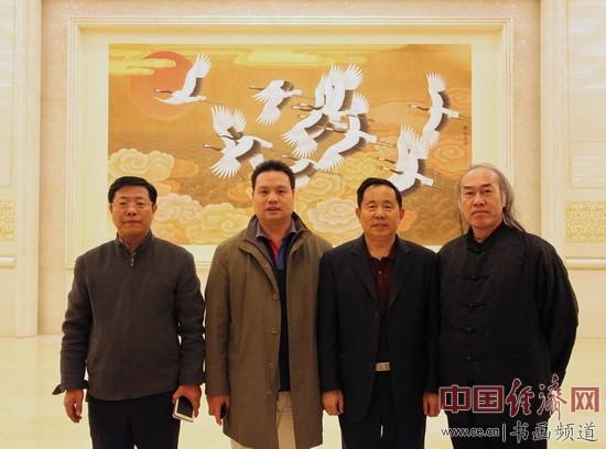 国画大家白雪狼 (右一)与梁建忠(左二)、李景祥(右二)、陈俊良 (左一)在人民大会堂合影