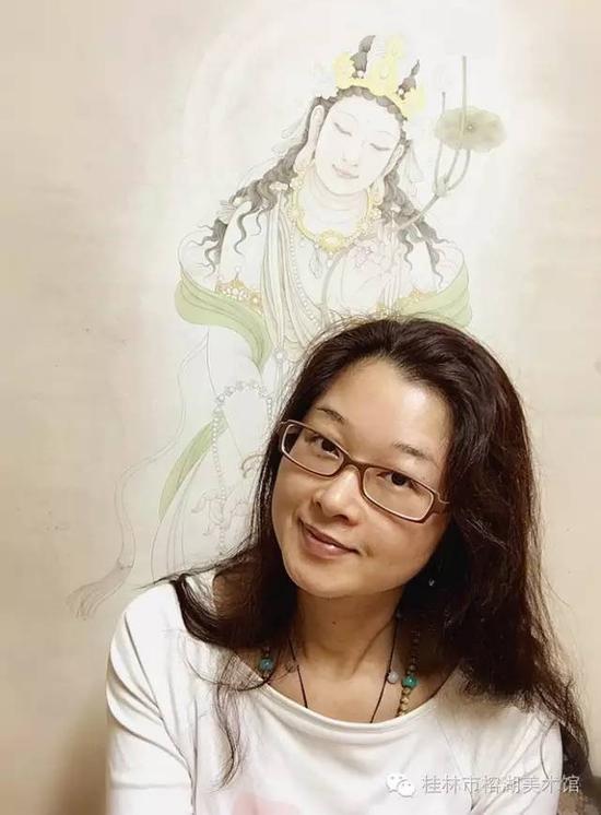廖 萱