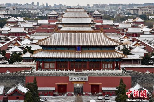 资料图:雪后的紫禁城一片银装素裹。中新网记者 金硕 摄