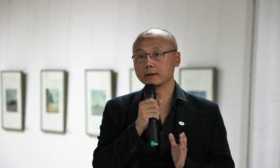 策展人程雷