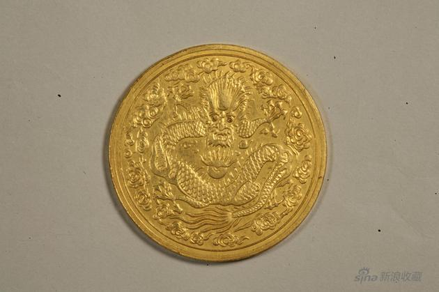 234b丙午大清金币一两,重量37、2克,直径38、8毫。光边。