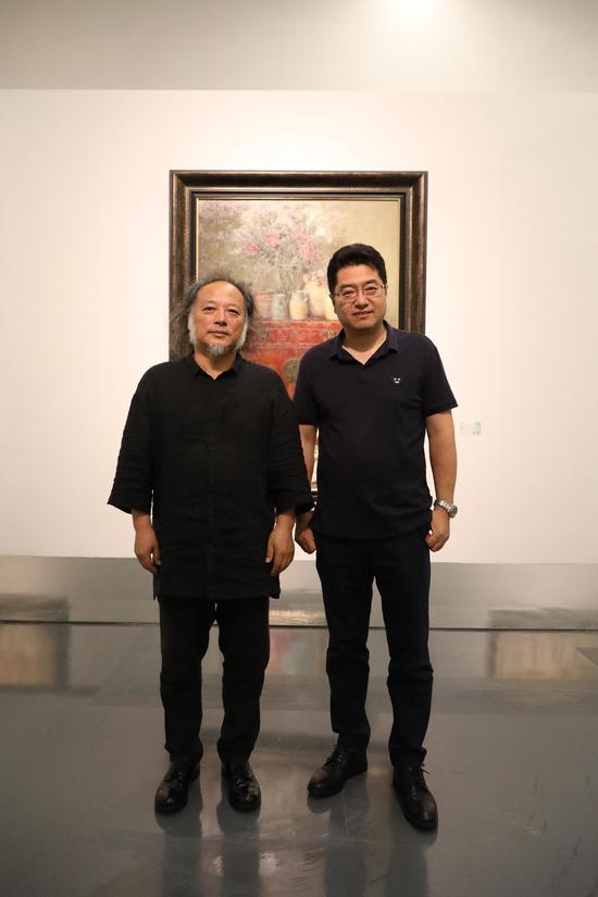 左:古琴艺术家王鹏,右:李大钧