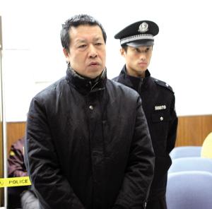 谭新生听取宣判。