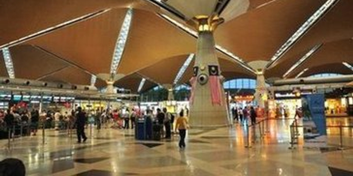 吉隆坡机场中国留学生志愿者:希望让同胞感受