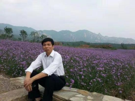 周骞老师患病前照片。(长沙理工大学供图)