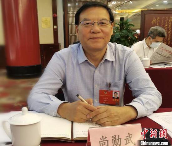 图为尚勋武参加全国两会。(资料图)受访者供图