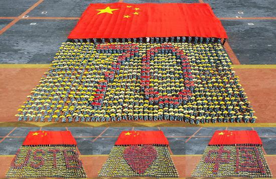 北京科技大学2019级新生联合方阵拼出”北科爱中国“(学校供图)