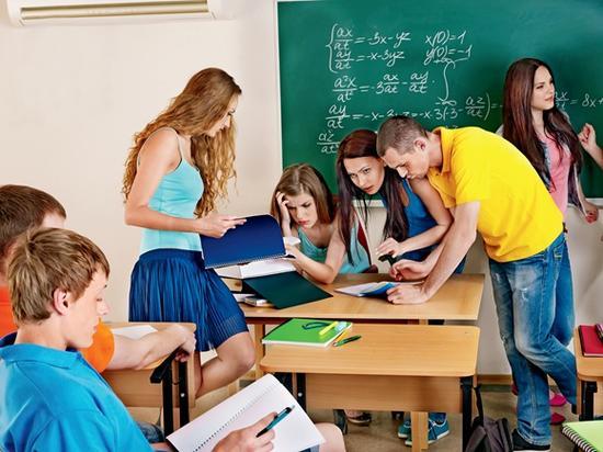 Group clever student near blackboard in classroom。
