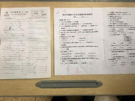 左为本学期第一单元综合能力检测卷,右为刚出成绩的学期期中测试卷