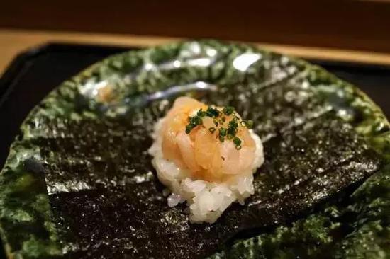 虎白餐厅招牌料理鳕鱼白子饭蒸