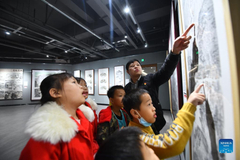 Art teacher records rural changes with paintings in south China's Guangxi