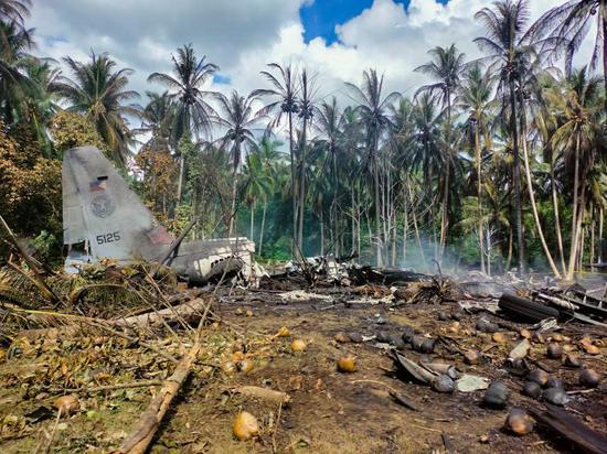 Photo shows the crash site of a C-130 military plane of the Philippine Air Force in Sulu Province, the Philippines, July 4, 2021. (Joint Task Force Sulu/Handout via Xinhua)