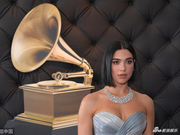 组图：啪姐黑色短发亮相格莱美红毯 穿银色长裙大秀事业线