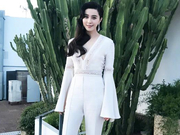 组图：范冰冰纯白装扮彰显气质 美腿修长深V性感