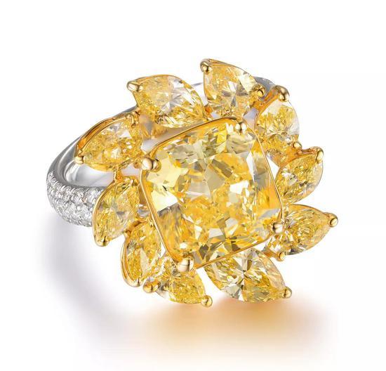 FANCY INTENSE YELLOW DIAMOND AND DIAMOND RING
