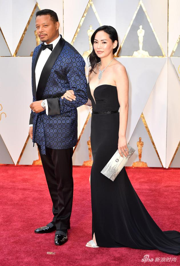 特伦斯-霍华德(Terrence Howard)和妻子米拉-白(Mira Pak)佩戴Piaget伯爵珠宝腕表出席奥斯卡金像奖颁奖典礼