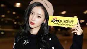 张天爱启程米兰时装周 清爽穿搭简约有范