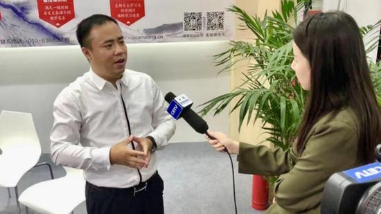 参展商北京许先网科技发展有限公司董事长许占林接受采访。