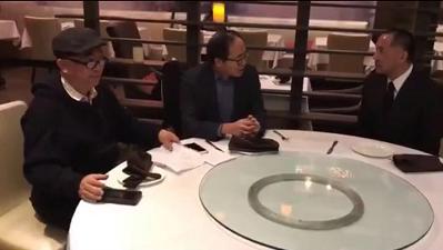 视频截图,郭文贵(右)约见媒体被呛声