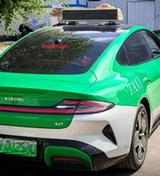 小米SU7出租车司机被同行举报