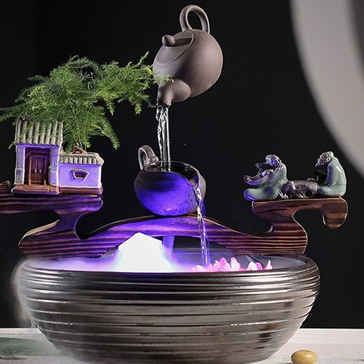 越来越多的有钱人家择创意流水摆件，寓意财源茂盛，来年大展宏图