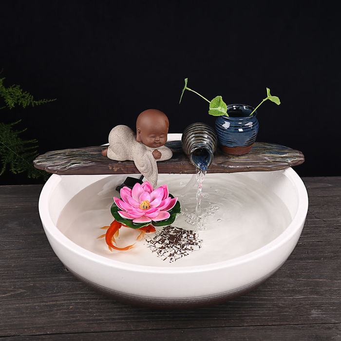 越来越多的有钱人家择创意流水摆件，寓意财源茂盛，来年大展宏图