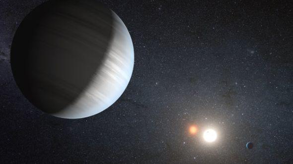 一位艺术家根据科学家的描述创作出来的“双子星”系统图。 一位艺术家根据科学家的描述创作出来的“双子星”系统图。