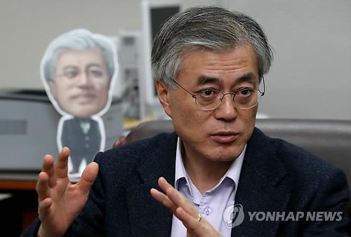 资料图片:文在寅接受采访。(图片来源:韩联社)