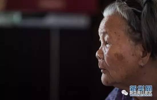 李美金在海南澄迈县中兴镇土龙村自己家中(8月9日摄)。