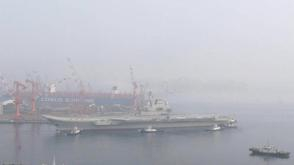 我国产航母调头出港