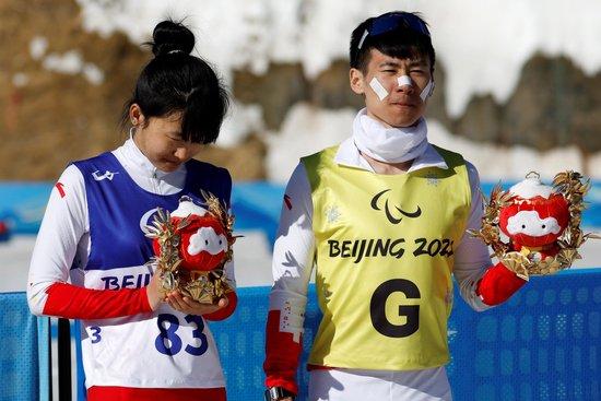△2022年3月8日,2022冬残奥会残奥冬季两项女子中距离(视障)比赛中,中国选手王跃获季军。