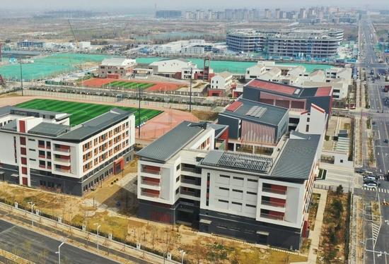 北京第四中学雄安校区和史家胡同小学雄安校区(2023年3月26日拍摄,无人机照片)。新华社记者 杨世尧 摄