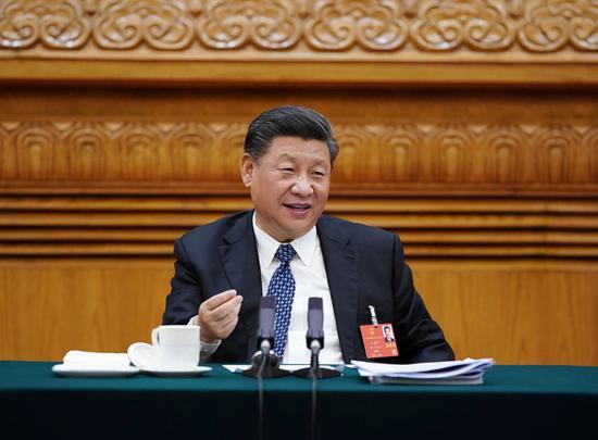 5月24日,中共中央总书记、国家主席、中央军委主席习近平参加十三届全国人大三次会议湖北代表团的审议。新华社记者 李学仁 摄