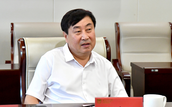 何英明，被查