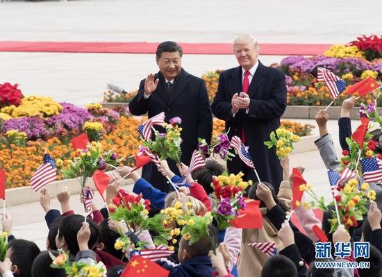 11月9日,国家主席习近平在北京人民大会堂东门外广场举行欢迎仪式,欢迎美利坚合众国总统唐纳德·特朗普对中国进行国事访问。 新华社记者李学仁 摄