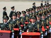 中韩举行第五批在韩中国人民志愿军烈士遗骸交接仪式