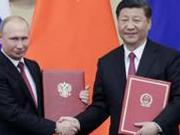 习近平同普京举行会谈:中俄伙伴关系成熟稳定牢固