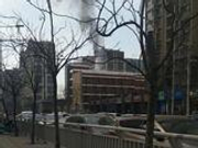 郑州一栋高层建筑着火 火势从20层往上蔓延(图)