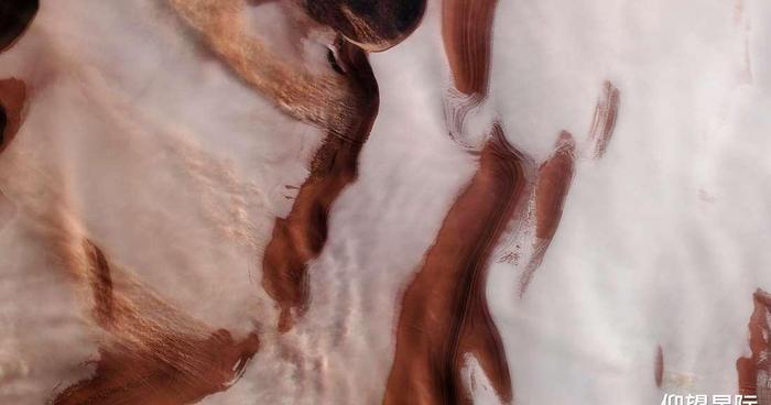和地球有什么不同？火星北极“涟漪般的冰和风暴”的新图像被公布