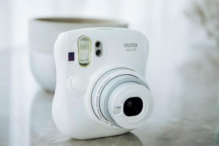 小姐姐用富士instax mini25给我拍照，那是恋爱的感觉