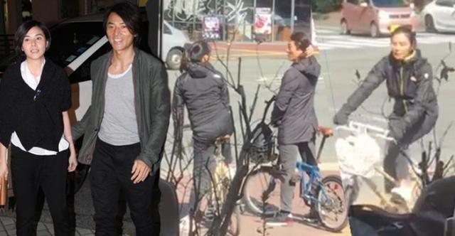 郑伊健夫妇同游日本，街头踩单车超浪漫，但没戴口罩太大意了