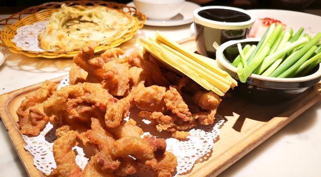 在青岛开了十七年的海鲜家常菜馆，靠着一碗粥竟做成了城市连锁