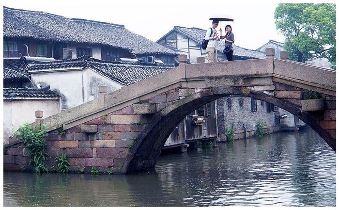 小桥、流水、人家，为什么江南古镇都需要有一座桥？