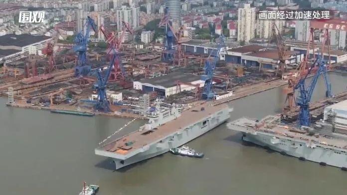 图片说明:两艘075型“双剑合璧” 澎湃视频截图